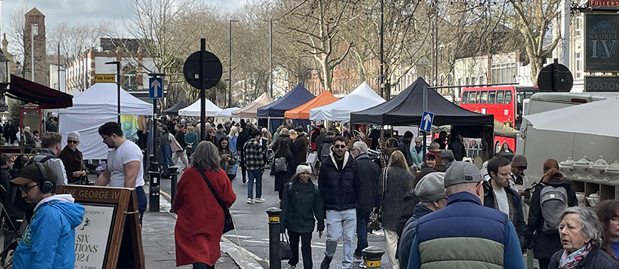 Explore antique wonders and vintage treasures at the vibrant Chiswick High Road Market. Uncover timeless gems